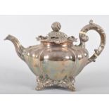 A Victorian silver melon form teapot, the domed lid set with a melon and leaf knop,
