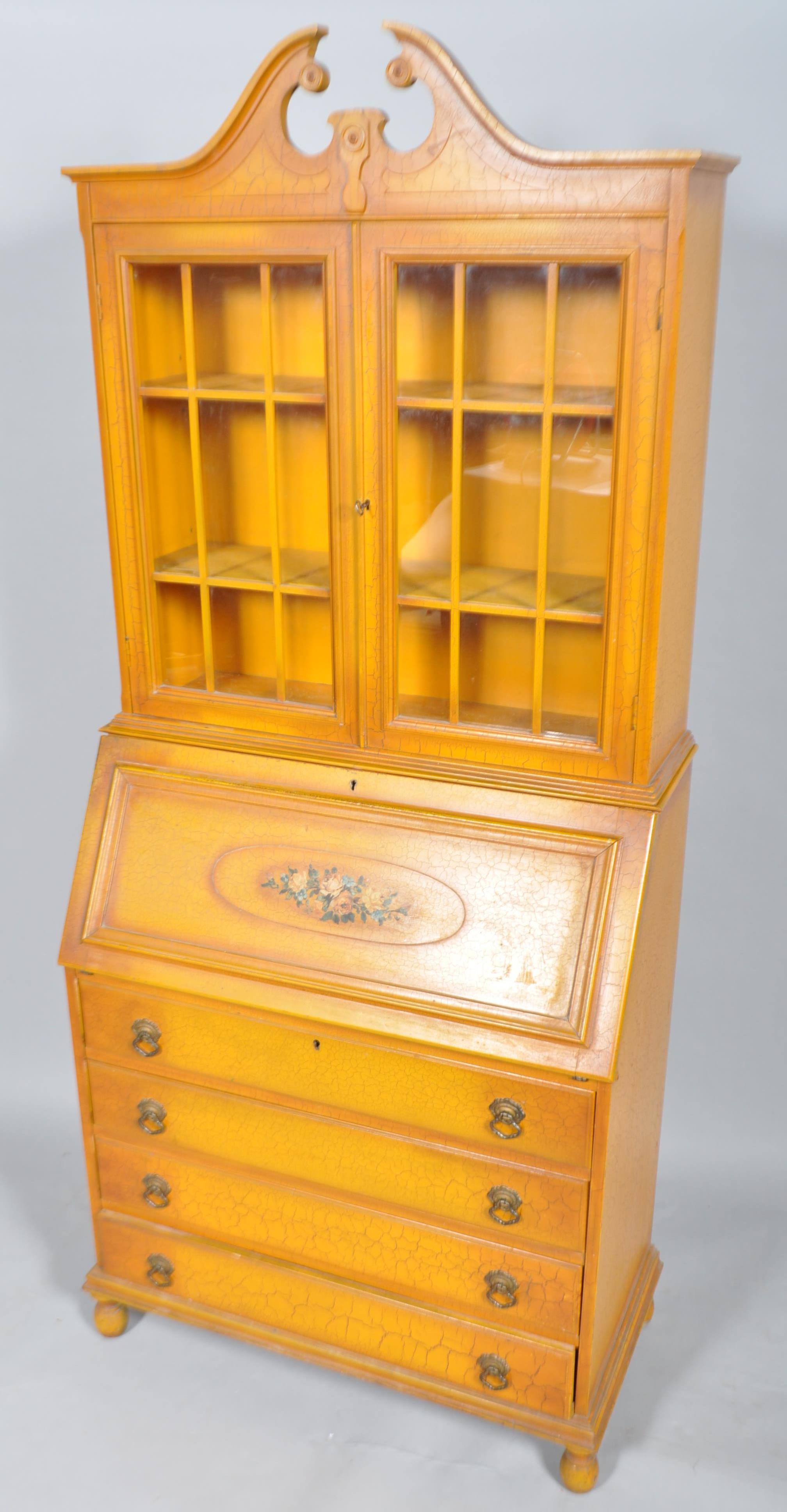 A reproduction painted bureau bookcase, the upper glazed section with two shelves,