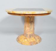 A circular occasional table, the marble veneered top inlaid with a chess board,