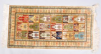A Turkish silk rug,