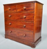 A 19th century victorian mahogany two over three chest of drawers having a flared top,
