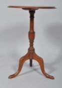 A George III style mahogany circular occasional table,