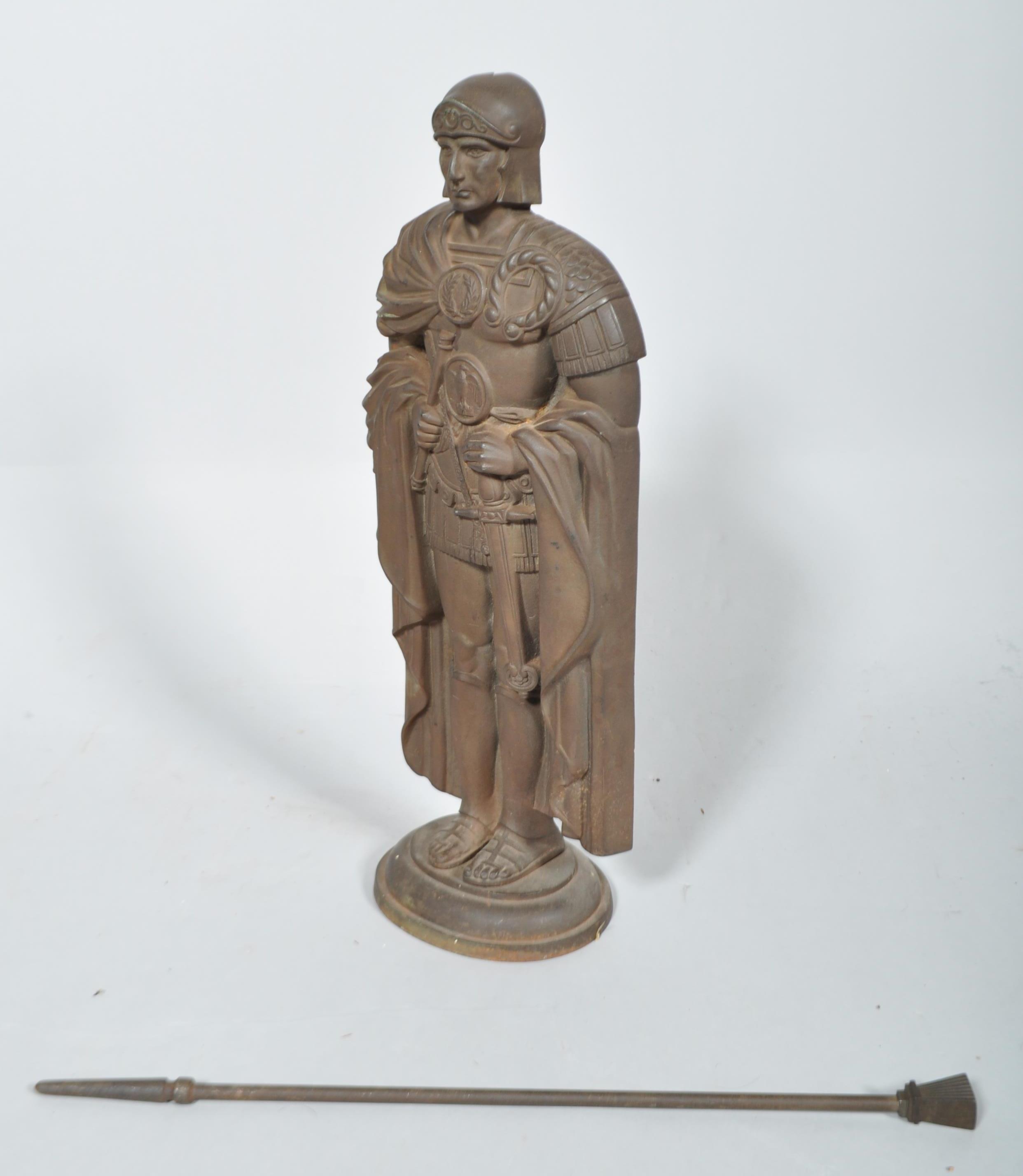 A cast iron fire companion set cast as a Roman Centurion stand, his plumed helmet forming a poker, - Image 2 of 2