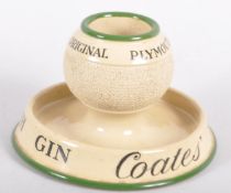 A Hancock & Corfield glazed stoneware Coates' Plymouth Gin match holder-striker, early 20th century,