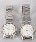 A collection of two Seiko quartz stainless steel wristwatches each fitted with a linked bracelet.