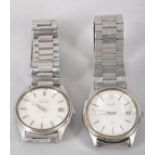 A collection of two Seiko quartz stainless steel wristwatches each fitted with a linked bracelet.
