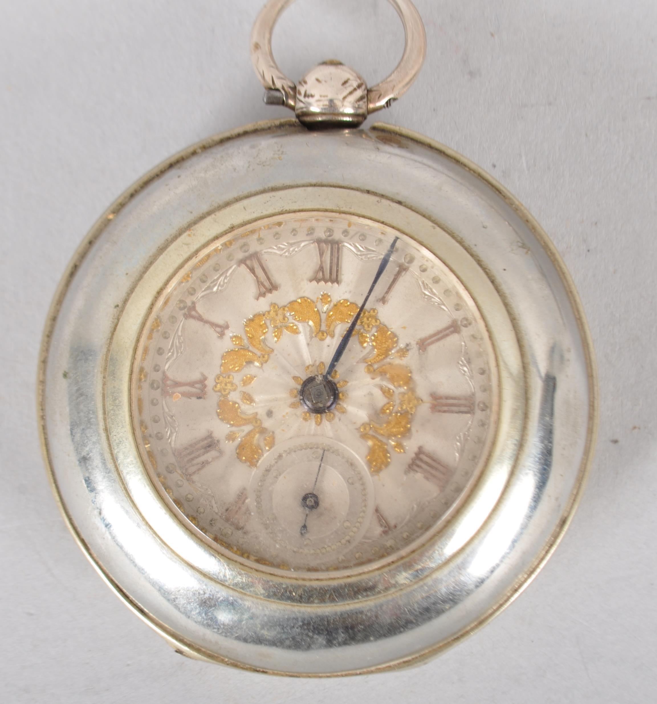 A sterling silver open face key wound pocket watch. - Image 2 of 4