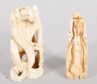 A bone carving of a five headed serpent, 10.5cm high and another of a dragon's head,