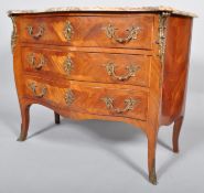 A French Louis XV style Kingwood marble topped ormolu mounted bombe commode, mid 19th century,