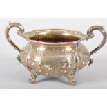 A silver sugar bowl, of shaped round form,