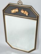 A contemporary ebonised and giltwood chinoiserie mirror, of octagonal section,