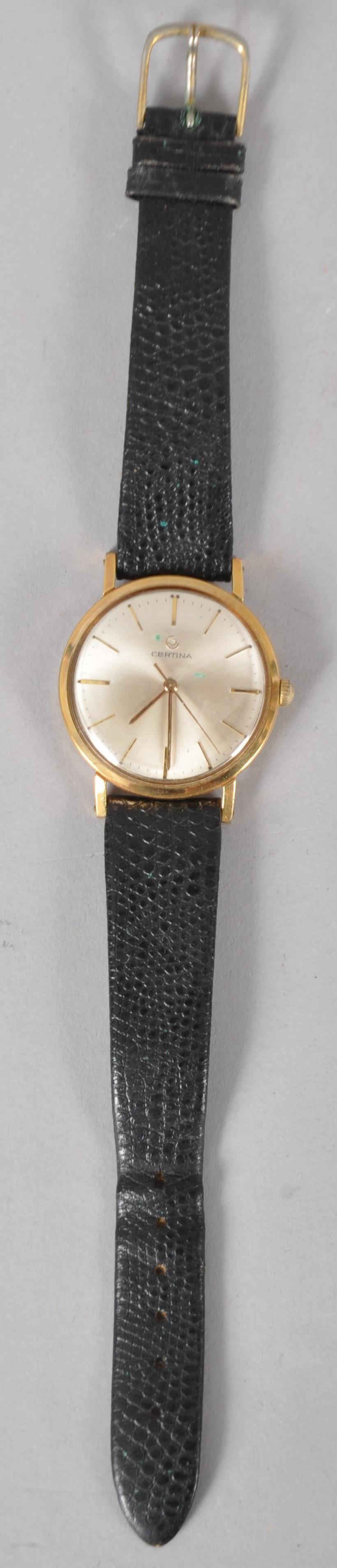 A gold plated mechanical Certina wristwatch. Circular silver dial with baton markings. - Image 2 of 2