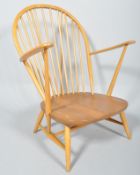 Lucian Ercolani, Ercol- Model 317, A 1970's vintage beech and elm low easy lounge chair/armchair