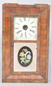 A late 19th century American mahogany wall clock of rectangular form having a squared face to the