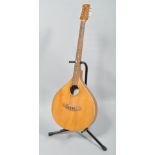 A Thomas Buchanan Luthier mandolin, bearing label for Model No B32, No 060105,