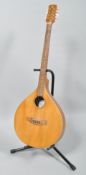 A Thomas Buchanan Luthier mandolin, bearing label for Model No B32, No 060105,