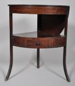 A George III mahogany corner wash stand, the top with circular apertures below foldable side panels,