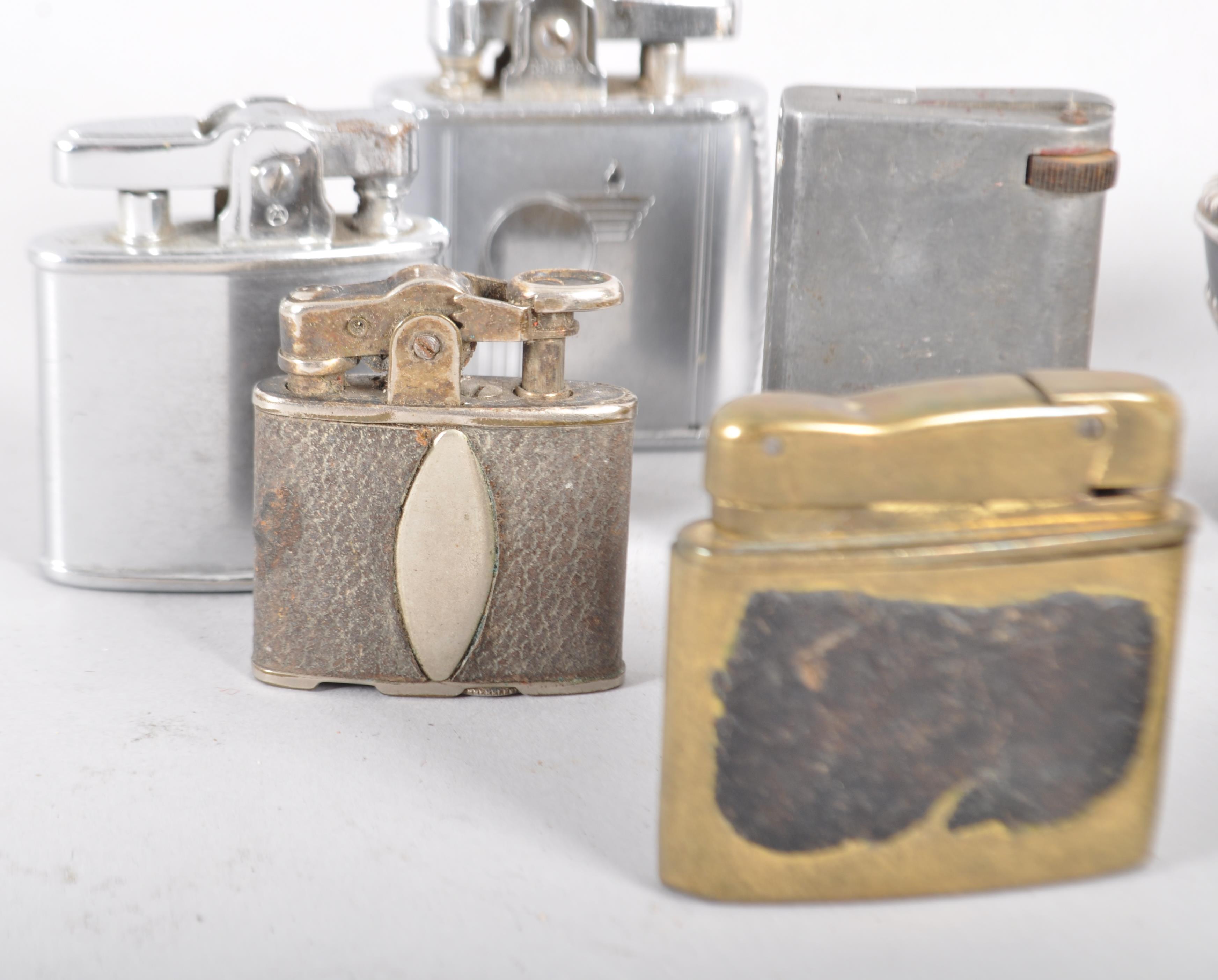 A collection of eight vintage cigarette lighters, including Ronson Viking, Standard, Domo, - Image 2 of 2