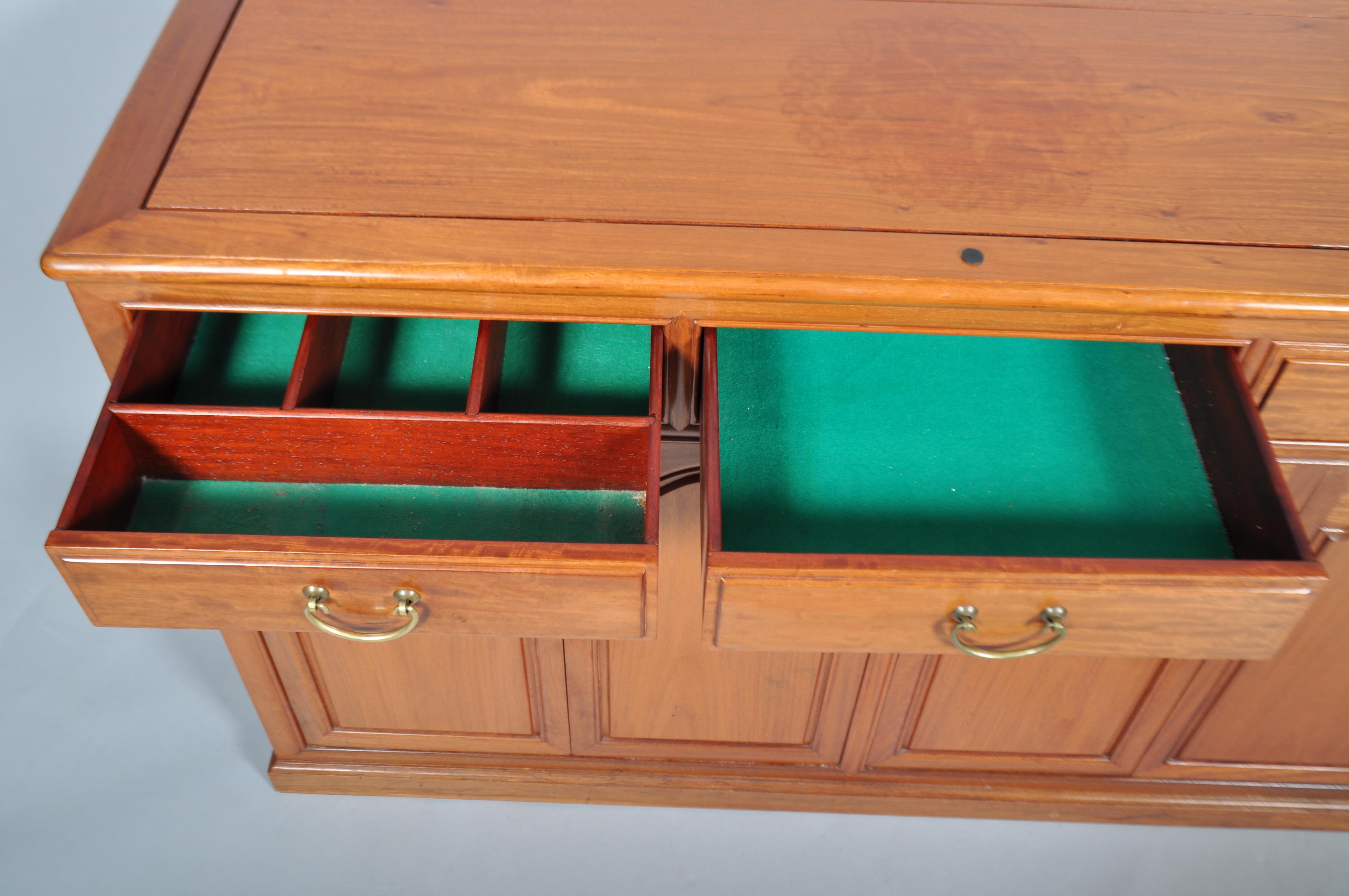 A 20th century Chinese rosewood sideboard, having a three drawer over cupboards configuration, - Image 4 of 4