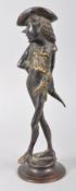 A Continental gilt bronze figural candlestick, modelled as a man, perhaps a matador,