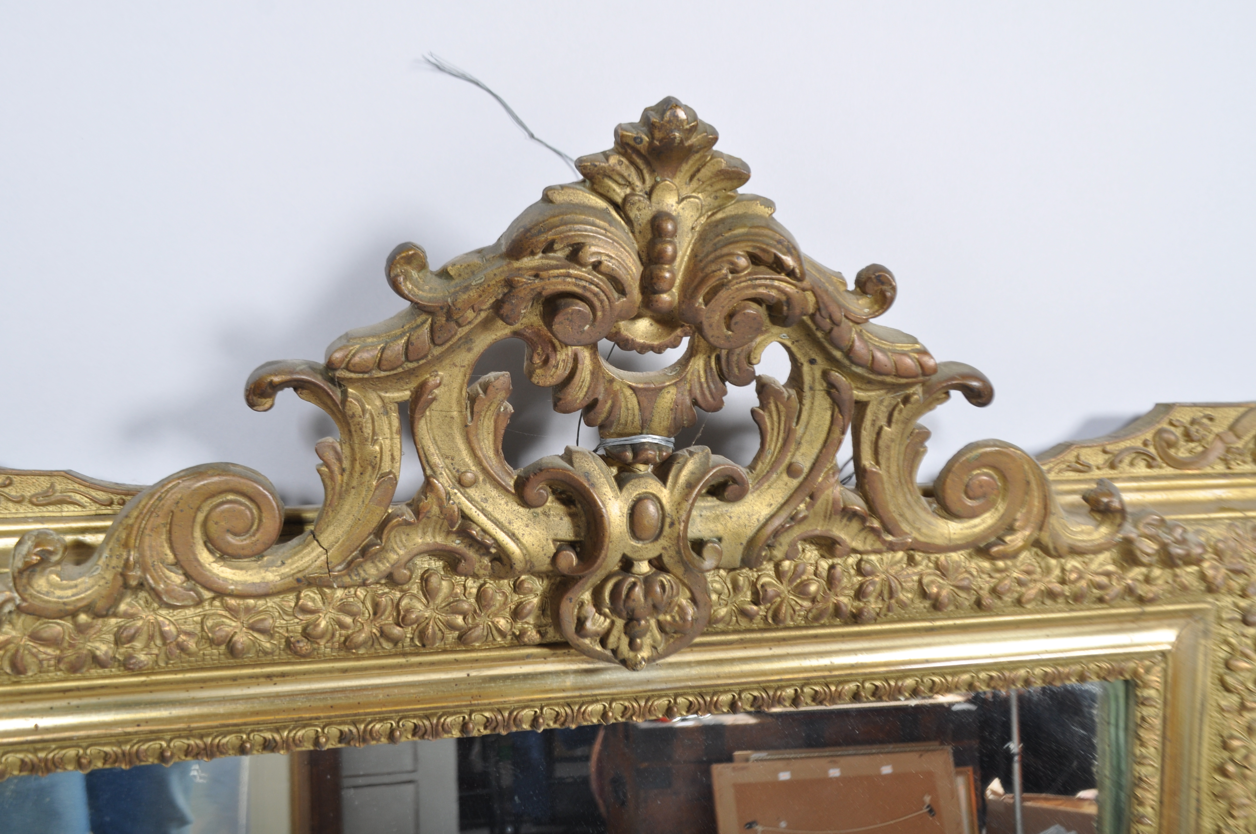 A carved giltwood and gesso georgian-style late 19th century overmantle mirror, - Image 2 of 2