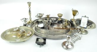 A small silver trophy cup, a quantity of silver plate,