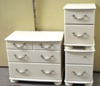 Two bedside tables and a chest of drawers