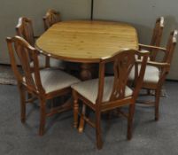 Six pierced splat chairs and a table