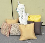 A quantity of cushions and a pair of blinds