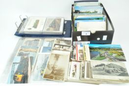 A box of postcards and an album