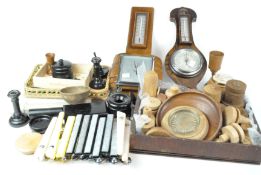 A collection of curios to include 1950's door handles and barometers