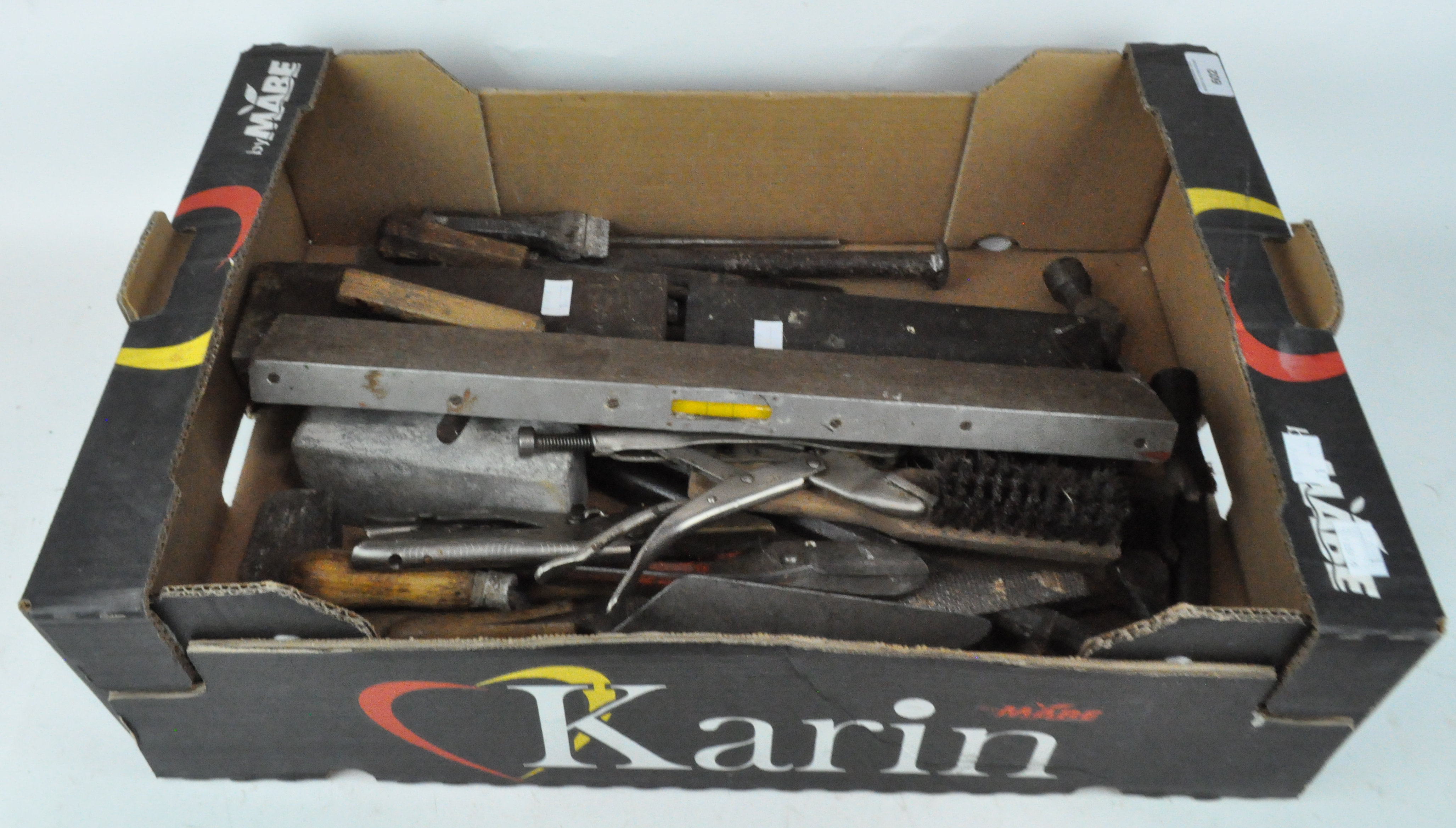 A large G clamp and a box of tools