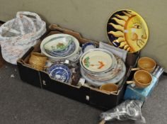 A collection of decorative cabinet plates and other items