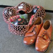 A set of bowling woods together with a pair of bowls shoes