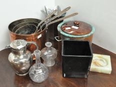 A set of copper pans and other metalware