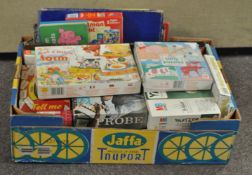 A box of childrens games and puzzles