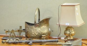 A brass lamp and other items