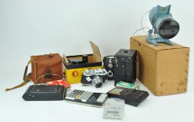 A selection of cameras and calculators