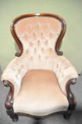 A Victorian style button back chair