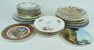 A group of collectors plates and other plates