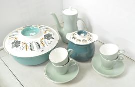 A collection of Poole pottery, lidded dishes,