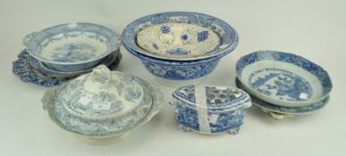 A group of antique and other blue and white china to include a flower brick