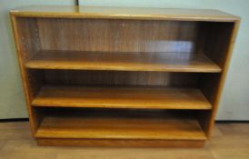 A standing bookcase with two adjustable shelves