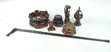 A collection of hardwood stands and other items