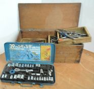 A socket set and drill bits