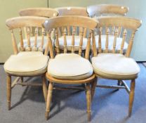A set of six pine stickback chairs