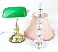 A perspex table lamp and a desk lamp