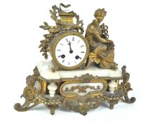 A French speltar and alabaster mantel clock