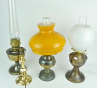 Two oil lamps and two electric