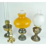 Two oil lamps and two electric